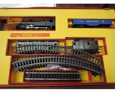 A Triang OO gauge RS44 train set, comprising 2-6-2 tank engine, three wagons and track