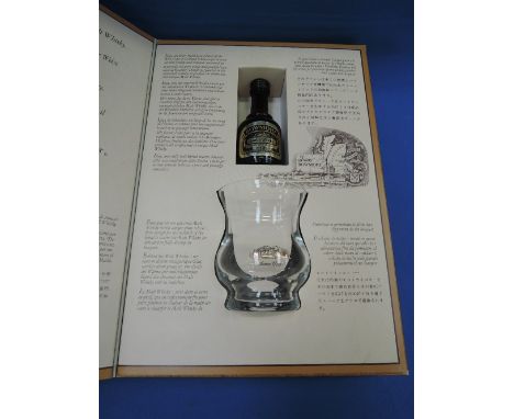 A Bowmore Islay Pure Malt Scotch Whisky glass tumbler gift box, with miniature single malt