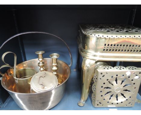 A late Victorian/Edwardian brass footman, a trivet, a similar period jam pan, candlestick etc