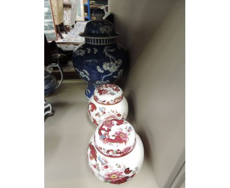 An early 20th century Chinese bowl lidded jar of bulbous design and a pair of Masons ginger jars
13" High
Condition: Some min