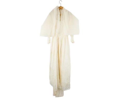 A vintage wedding dress - 'Bless the Bride', white lace, size 12.