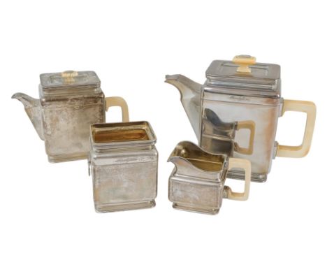 An Art Deco Austrian style white metal four piece tea service - of square form with ivory knops and handles, 1,130g all in. I