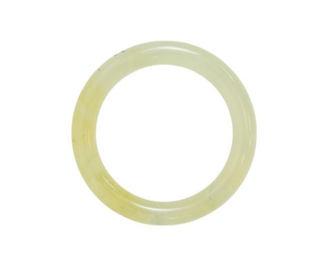 A green jade bangle - internal diameter 6cm.