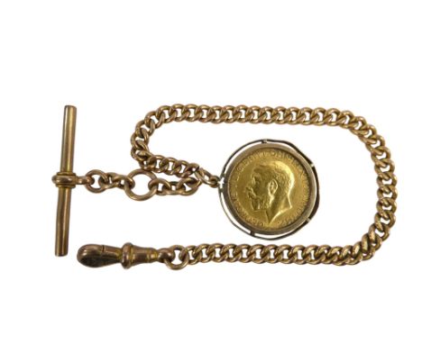 A George V sovereign - 1911, on a 9ct gold curb link watch chain, 27.8g.