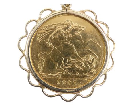 An Elizabeth II sovereign - 2007, within a 9ct frame on a fine link chain, 13.1g.
