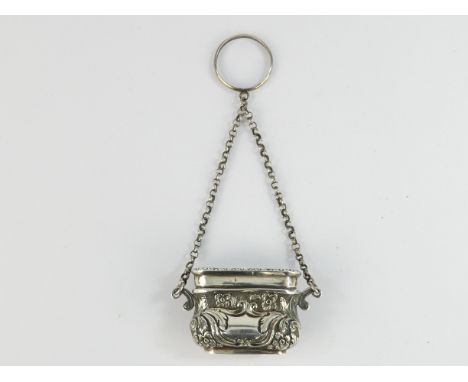 A silver vinaigrette modelled as a fishing creel - Birmingham 1856, Joseph Willmore, foliate repousse with gilt lining, 14cm.