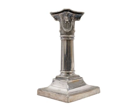 A silver Corinthian shaped candlestick - London 1866, James Dixon &amp; Sons Ltd, height 16cm.