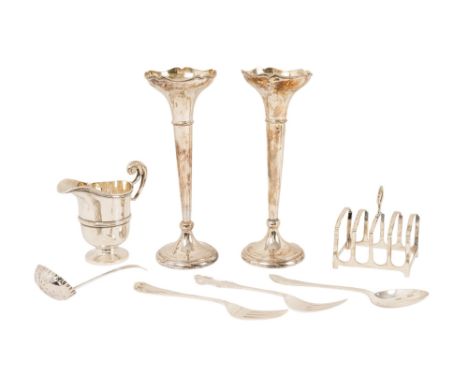 A small quantity of silver - including a toast rack, a cream jug, two stem vases, a sugar sifter, two forks and a christening