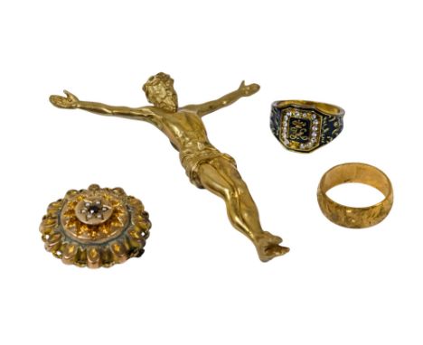 A gilt figure of Jesus - together with a gilt brooch and two rings. (4)