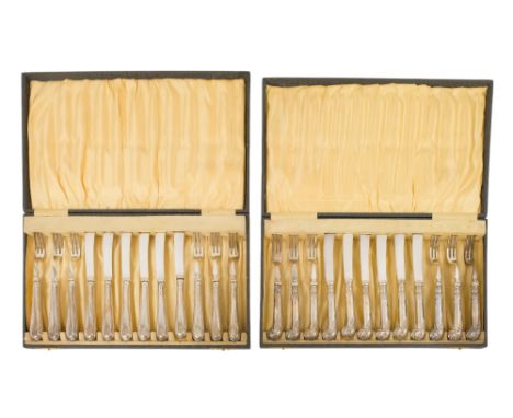 Two boxed sets of fruit eaters for six place settings - Sheffield 1922, with foliate pistol-grip handles.