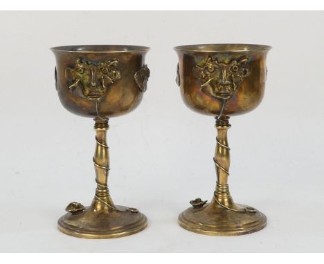 A pair of silver plated goblets - Rene JULIEN (Belgium 1937-2016) with an applied mask and other motifs and with a spiral wir