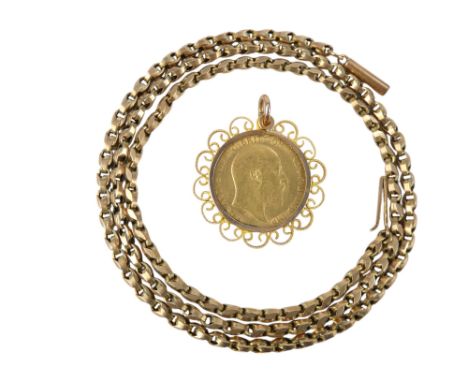 An Edward VII half sovereign - 1907 within a filigree mount, on a yellow metal chain.