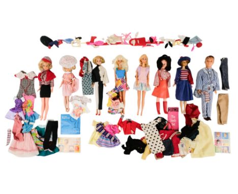 A Barbie doll - with a trousseau of clothing, together with seven other similar dolls including clothes.