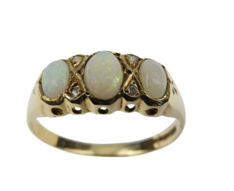A 9ct gold opal and diamond ring - size O/P, weight 1.8g.