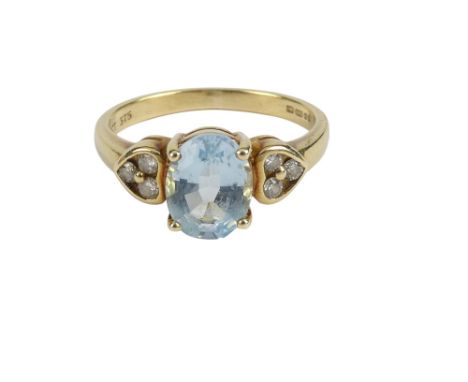 A 9ct gold aquamarine and diamond ring - size J/K, weight 2.2g.