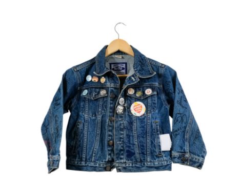 A Hard Rock Cafe denim jacket - with a multitude of signatures including the following: Chevy Chase, Lorna Dern, Kelly Osbour