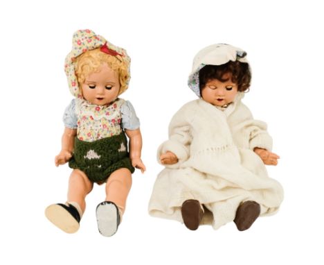 A mid 20th century composition doll - with articulated eyes, open mouth and bent limbs, fitted with a crying mechanism, 44cm 