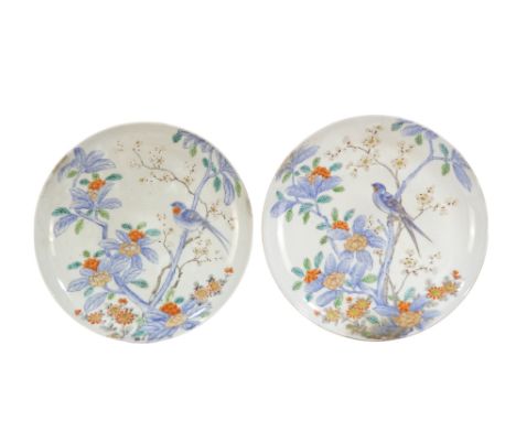 A pair of early 20th century Japanese plates - decorated in enamels with birds in branches, signed with character marks to ba