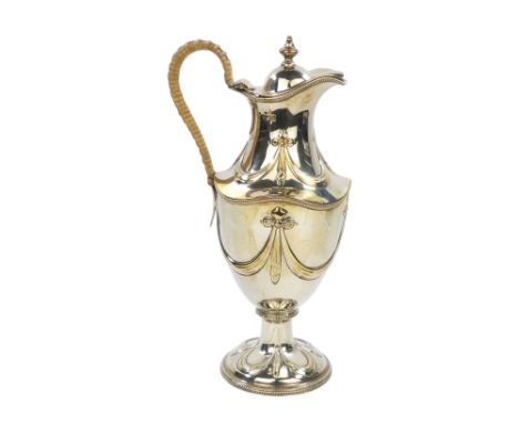 A silver wine ewer - London 1897, Henry Stafford, decorated with swags and bows, 696g.