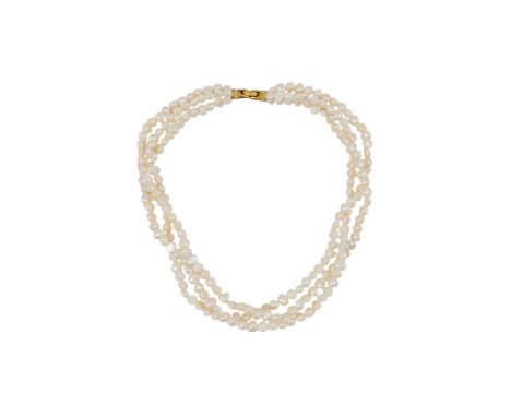A three row seed pearl necklace - with gilt metal clasp, length 42cm.