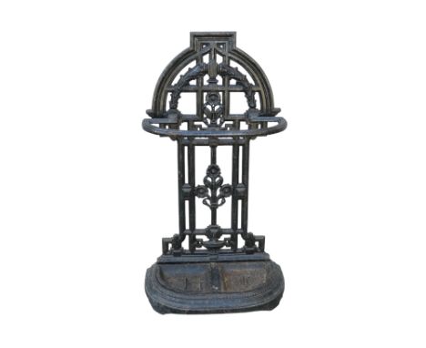 A 19th century cast iron stick and umbrella stand - decorated with floral garlands, 86cm high.