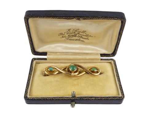 A late Victorian 9ct gold turquoise set bar brooch - of twisted form and set with three cabochon stones, in period box, 3.5g.