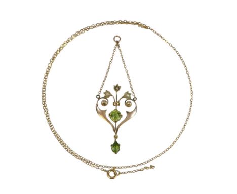 A 9ct gold peridot and seed pearl set pendant - with 9ct gold chain, total weight 2.6g.