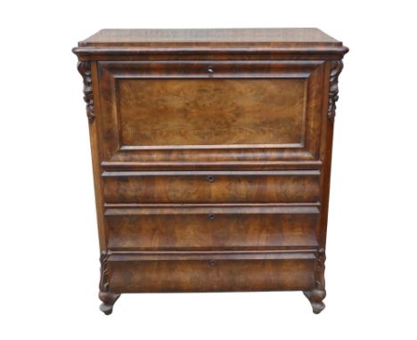 A late 19th century Biedermeier style secretaire - the panelled fall above an arrangement of three drawers flanked by canted 