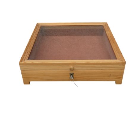 A 20th century pine table top display cabinet - with a lockable glazed hinged cover, 51 x 50 x 14cm.