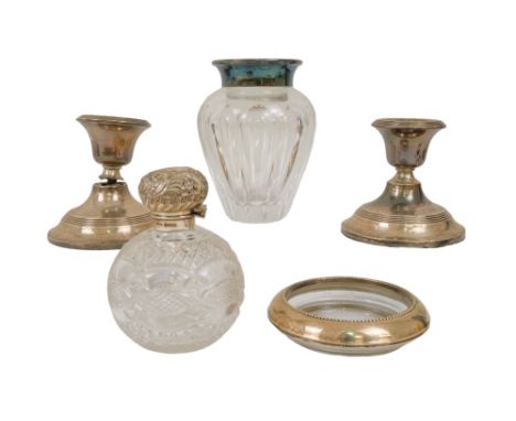 A pair of silver chamber sticks - Sheffield 1919, of squat circular form, together with three other silver mounted glass dres