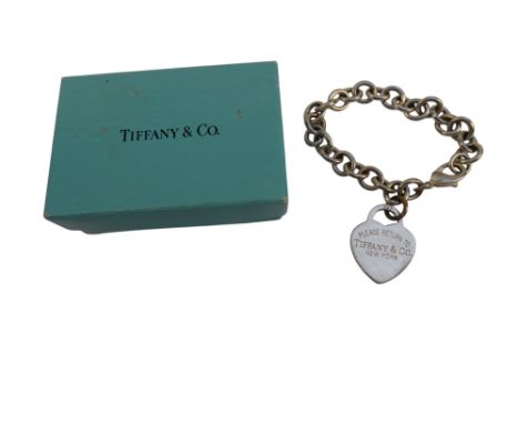 A Tiffany style silver bracelet - with heart shaped pendant, in retail box.
