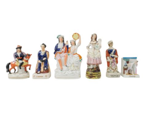 A 19th century Staffordshire figure of Lord Byron - wearing a blue suit with a brown cape, 18cm high, together with a figure 