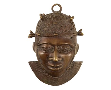 A Benin bronze hip mask - height 19cm.
