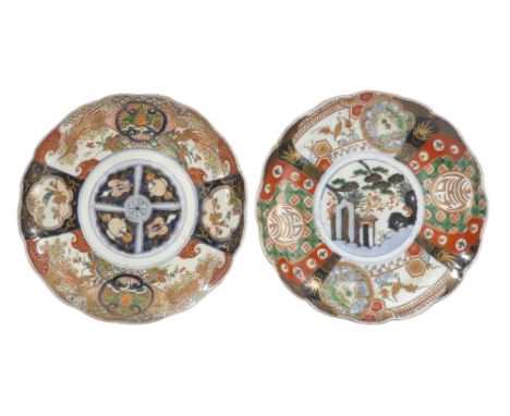Two early 20th century Imari style plates - one decorated with a temple scene to the centre. (2)