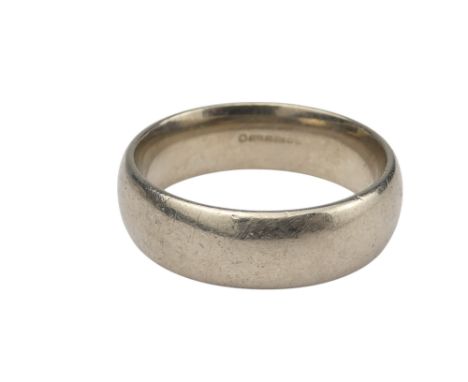 An 18ct white gold wedding band - size O, 8.6g.