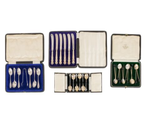 A boxed set of tea spoons and tongs - Sheffield 1919, together with a boxed set of butter knives, a boxed set of enamel teasp