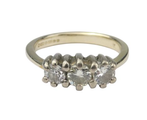 An 18ct white gold three stone diamond ring - size N-M, 4.4g.