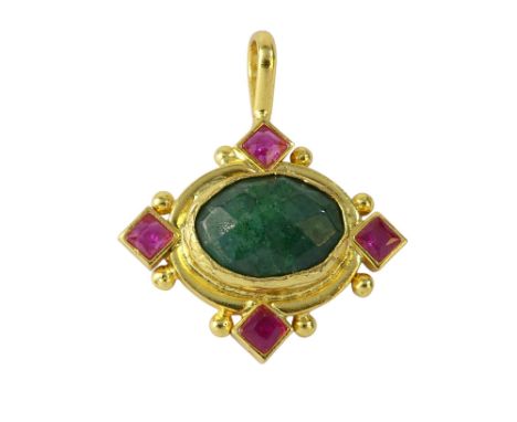 A ruby and emerald set pendant - with an oval cut central stone, within a gilt metal mount, 5g.