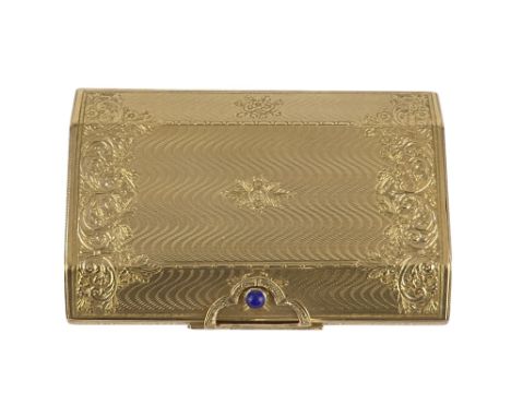 A 9ct gold box/necessaire - of contoured rectangular form with wave engine turning and leaf engraving, 53.8g.