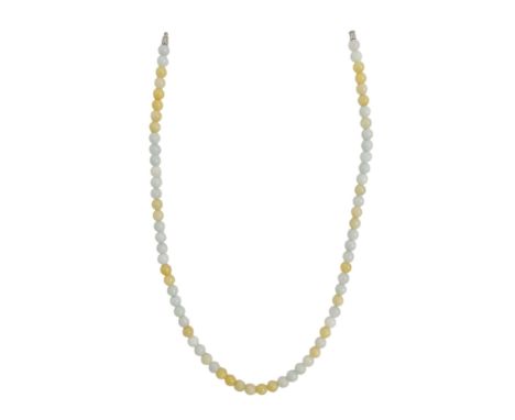 A jade necklace - of small uniform beads, length 52cm.