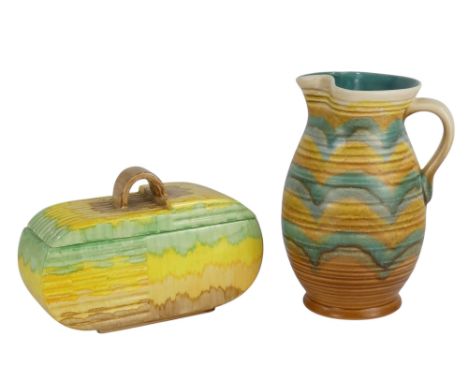 A Beswick Art Deco style pot and cover - of rounded rectangular form, decorated in brown, yellow and green, 16cn high, togeth
