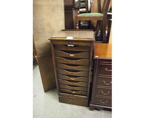 AN OAK FILING CABINET WITH TAMBOUR SHUTTER FALL-FRONT, 1 7" WIDE, 3'4" HIGH (NO KEY) 