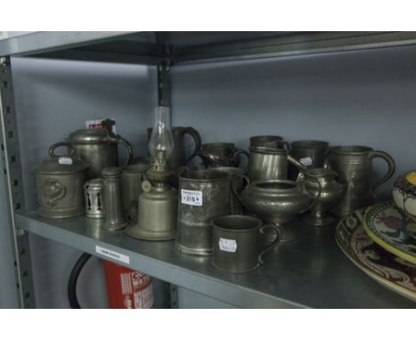 A LARGE ELIZABETH II COMMEMORATIVE PEWTER TANKARD, TOGETHER WITH A COLLECTION OF PEWTER TANKARDS, CHAMBER STICK, BOWLS, ETC..