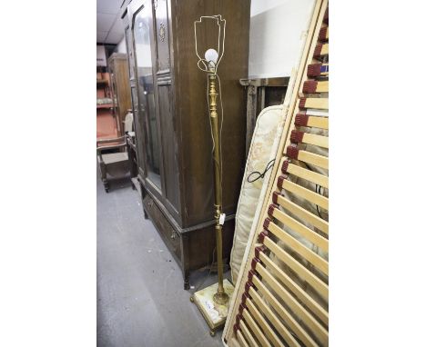 A BRASS AND ONYX STANDARD LAMP WITH SILK SHADE 