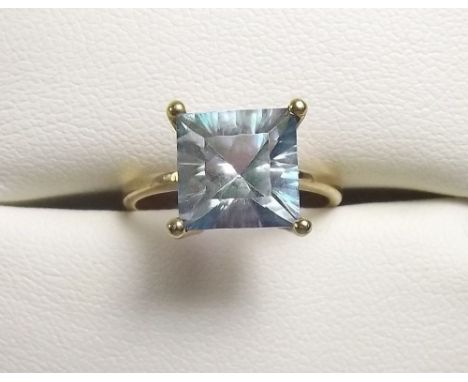 A 9 carat gold princess cut azure topaz ring, size M and a half