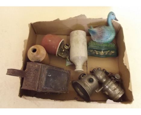 A hand lamp, a Miller bicycle lamp and various other collectables