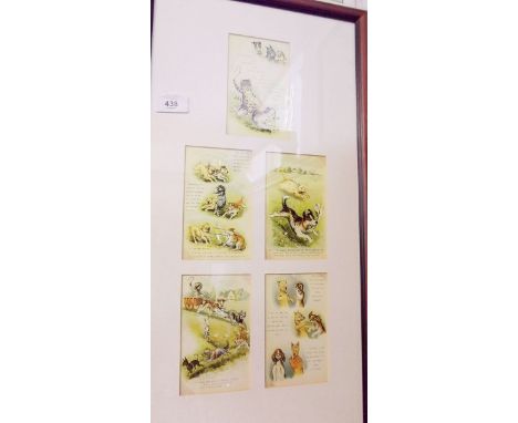 A framed group of Louis Wain style postcards