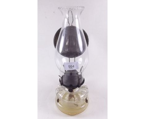 A glass lace-makers lamp