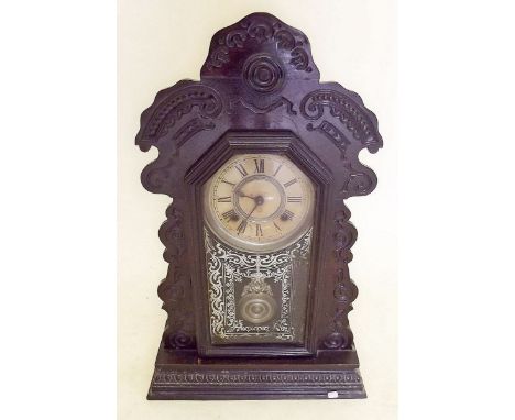 An American Ansonia shelf clock with carved wood 'gingerbread' surround - 58cm