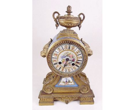 A fine 19th century French ormolu mantel clock with Sevres style floral painted porcelain panels on a turquoise ground with u